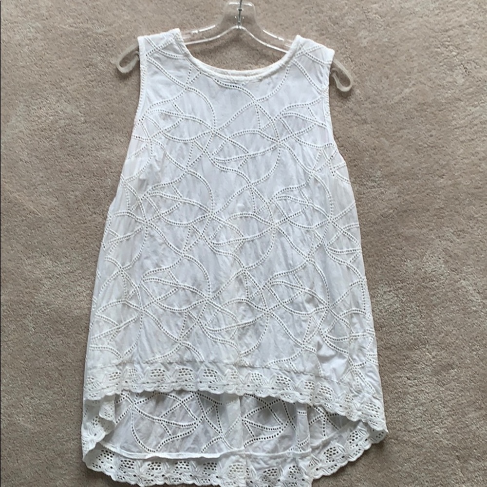 White sleeveless top
